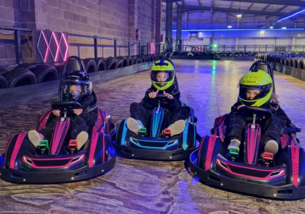 Young children in go karts. 